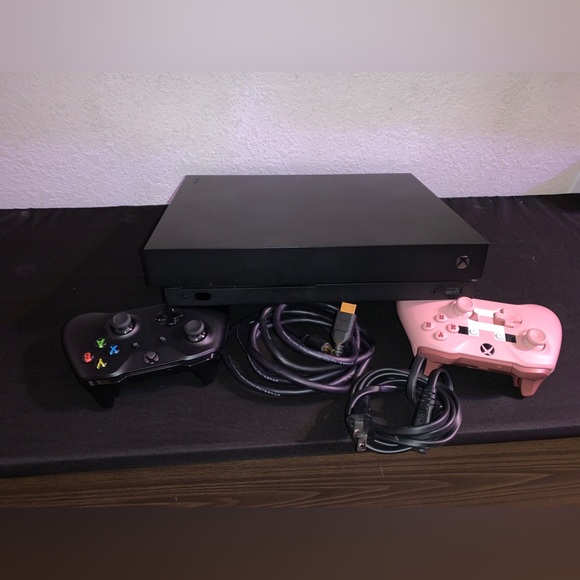 Xbox 1 X 2 controllers power and HDMI cable.